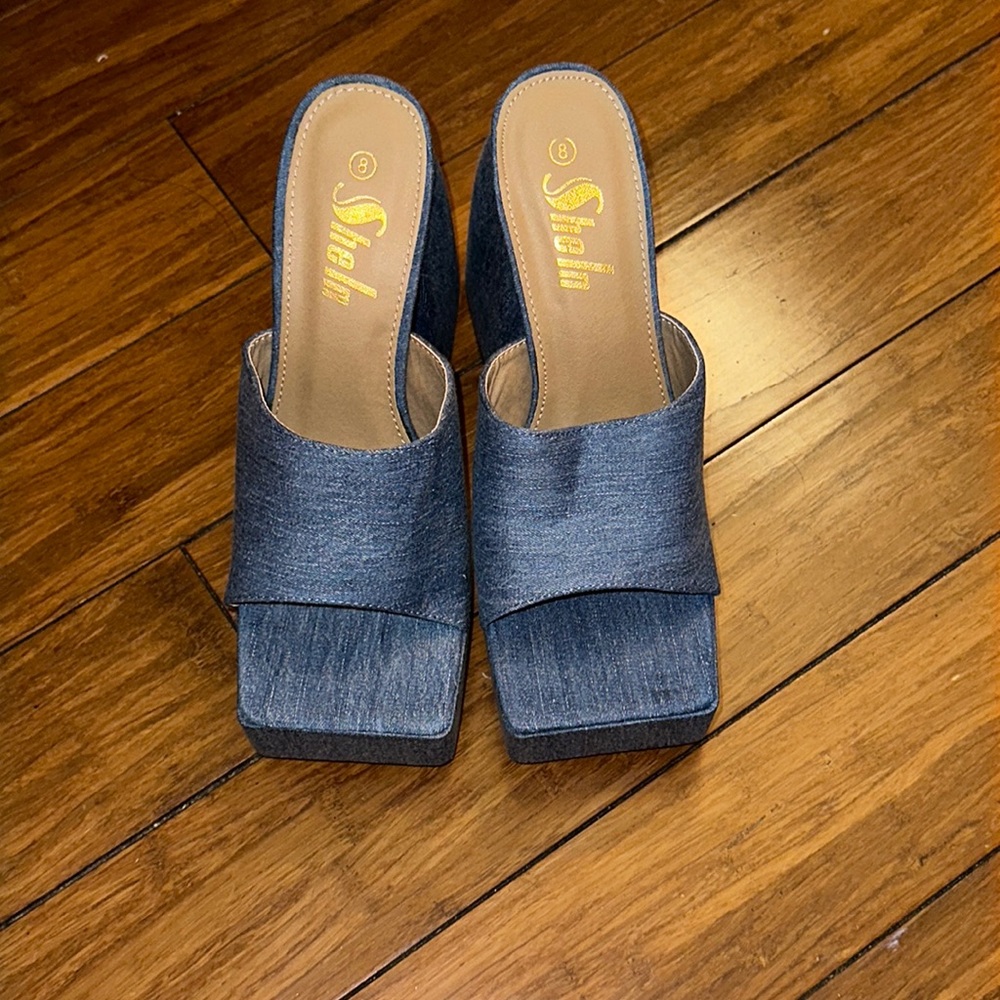 Denim heel. Never been worn. Size 8.